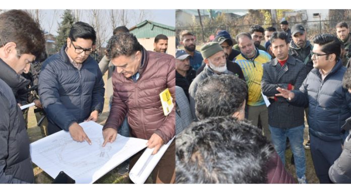 Deputy Commissioner Bandipora, Dr Owais Ahmad inspecting proposed site of Indoor Sports Hall at S K Sports Stadium on Wednesday.