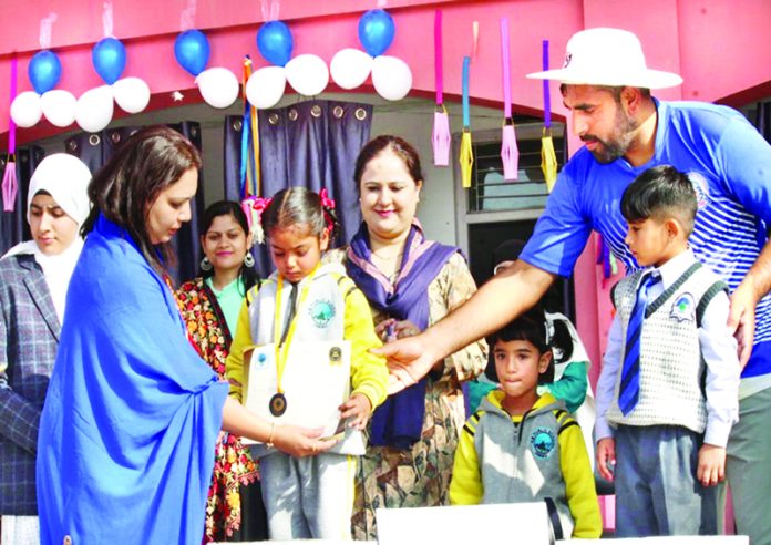 A dignitary presenting certificate to a student during Annual Sports Day.