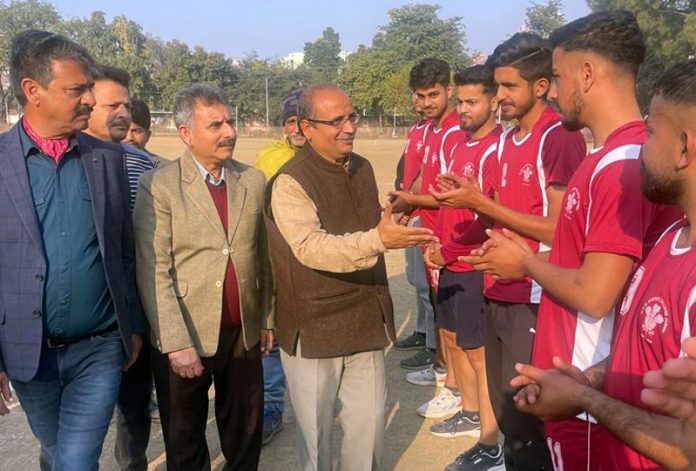 Dr Ranvijay Singh, Dean Student Welfare Cluster University of Jammu interacting with players on Wednesday.