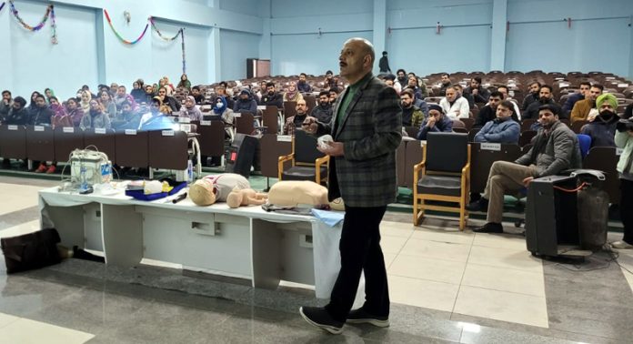 An expert demonstrating on CPR during an awareness programme held at GMC Baramulla on Wednesday.