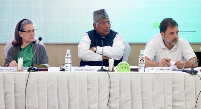 Congress president Mallikarjun Kharge with party leaders Sonia Gandhi and Rahul Gandhi chairing the Congress Working Committee meeting, in New Delhi on Thursday.(UNI)