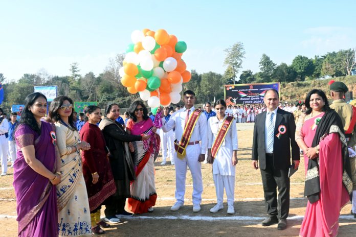 Chief Guest releasing balloons during annual day event at APS Akhnoor.
