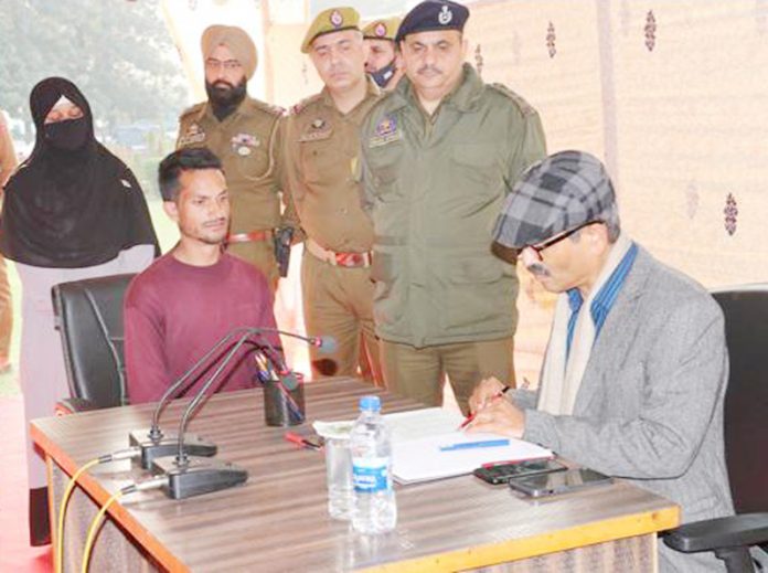 DGP RR Swain interacting with people at Police Headquarters in Jammu on Monday.