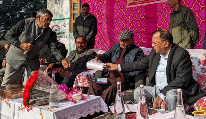 ACS Home RK Goyal listening public grievances at Ghaink Panchayat of Bhalwal on Friday.