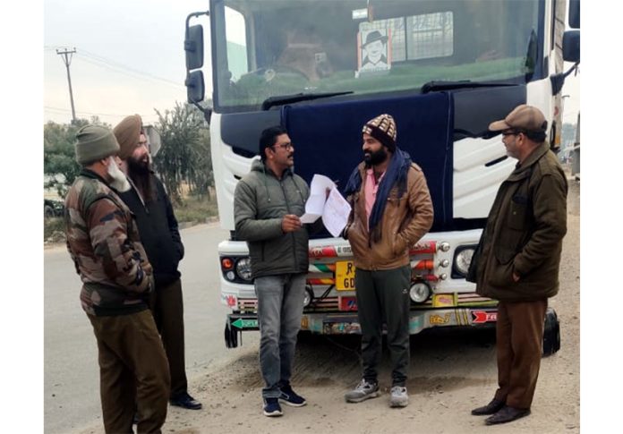 Flying squad of STD checking a bus.