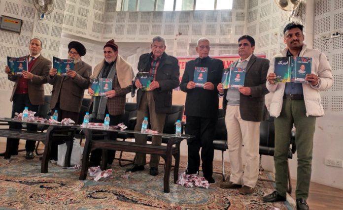 Prof. Quddus Javed along with others releasing a book on Urdu Poetry in Jammu on Saturday.