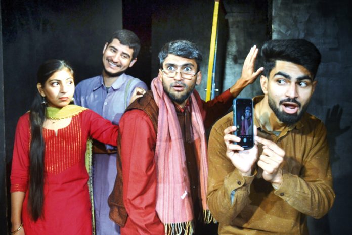 A scene from play ‘Do Kalakaar’ staged at Jammu on Sunday.