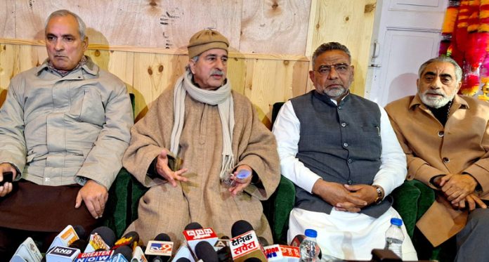 PDP senior leader Sartaj Madni addressing press conference at Srinagar. —Excelsior/Shakeel