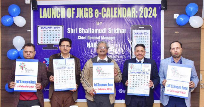 CGM NABARD and others unveil J&K Grameen Bank e-calendar for year 2024.
