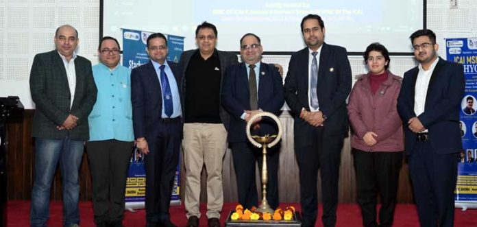 Guest speakers with members of J&K ICAI during a seminar at Jammu on Friday.
