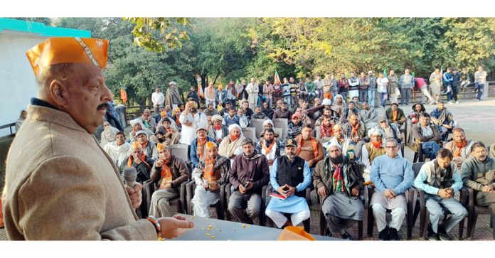 Senior BJP leader Devender Singh Rana addressing a meeting in Nagrota constituency.