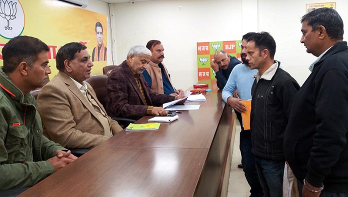 BJP leaders listening public grievances at Jammu on Thursday.