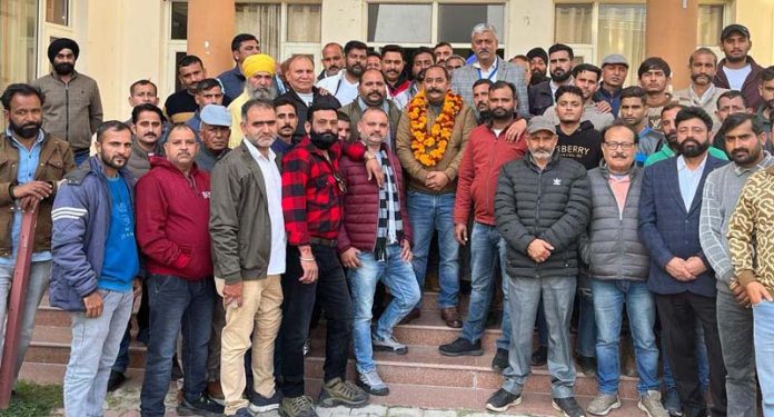 Newly elected president, JKDFA Sandeep Singh Chib posing with other members of the association in Jammu on Sunday.