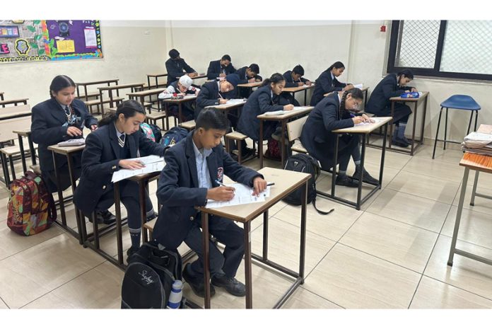 Students participate in Padhoji Scholarship Exam in Jammu on Sunday.