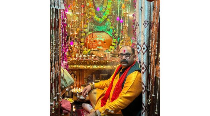 Mahant Rumil Sharma offers Puja at ancient Bhairav temple in Chowk Chabutra, Jammu on Monday.