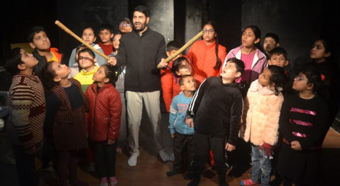 Balwant Thakur, Director Natrang during an exclusive session with children at Jammu on Saturday.