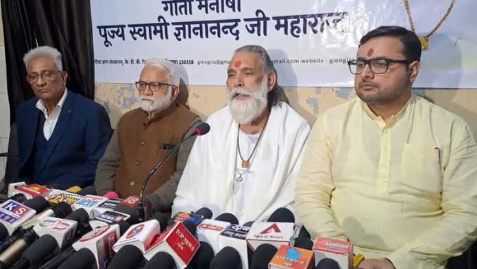 Swami Gyananand along with Parshotam Dadhichi and Chetan Wanchoo addressing a press conference at Jammu on Monday.