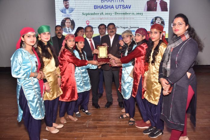 Director Samagra & DSEJ awarding students during valedictory function of Bhartiya Bhasha Utsav on Monday.