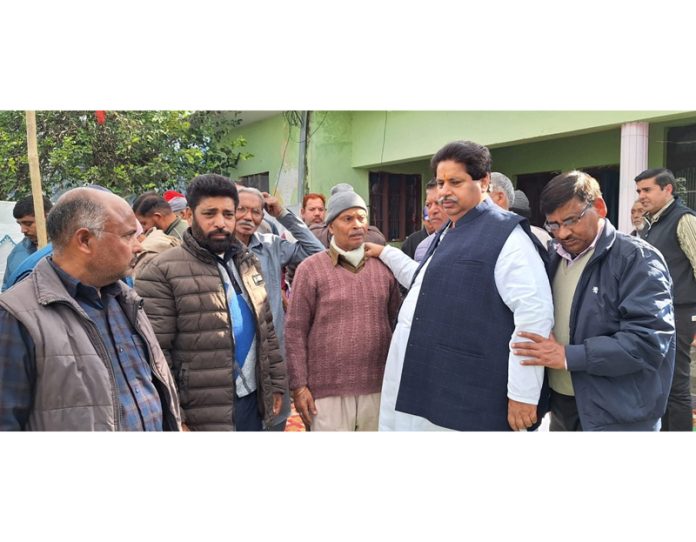 Senior Cong leader Raman Bhalla interacting with people in Jammu on Sunday.