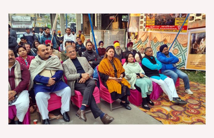 BJP leaders during a Booth Jan Samvad Abhiyan at Ward 45 Jammu on Sunday.