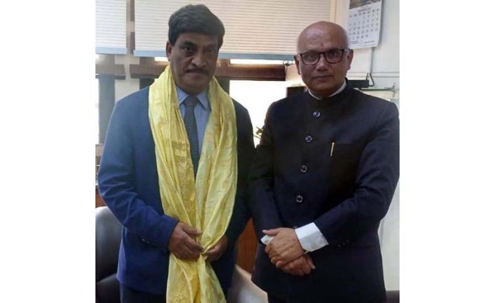 Former Mayor Rajinder Sharma with outgoing Chief Secretary Arun Kumar Mehta.