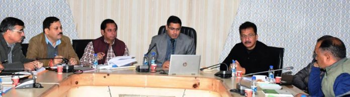 DC Rajouri and MD JJM chairing a meeting.