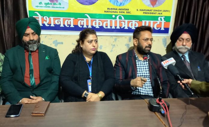 NLP National president Suhail Choudhary and other party leaders during a press conference at Jammu.
