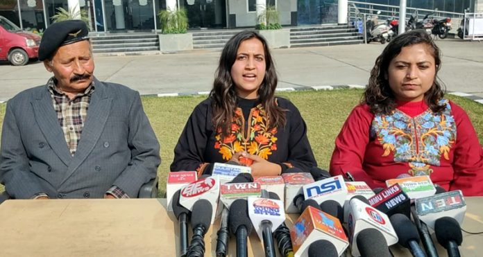 Riya Kaluria, Trustee of General Zorawar Singh Memorial Educational and Charitable Trust addressing a press conference at Jammu on Saturday.