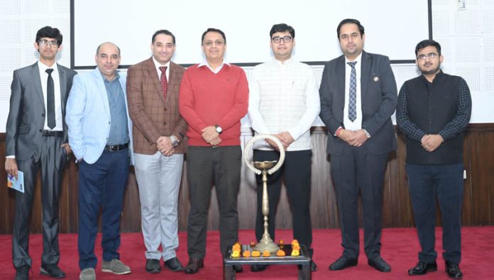Chairman of ICAI J&K Branch Vikas Purdhani posing with other members during a seminar at Jammu.