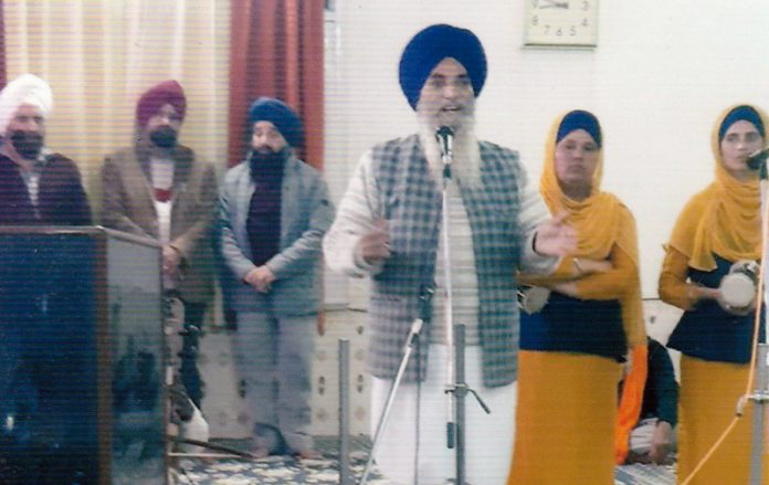 A Sikh preacher giving sermons during a Gurmat Samagam at Gurdwara Singh Sabha, Guru Nanak Nagar in Jammu.