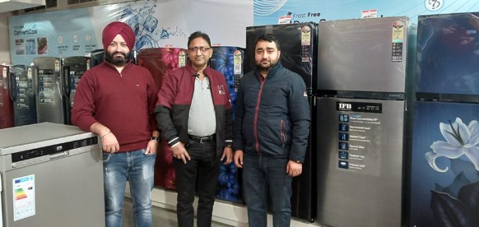 Refrigerators and other products being displayed by IFB in Jammu.