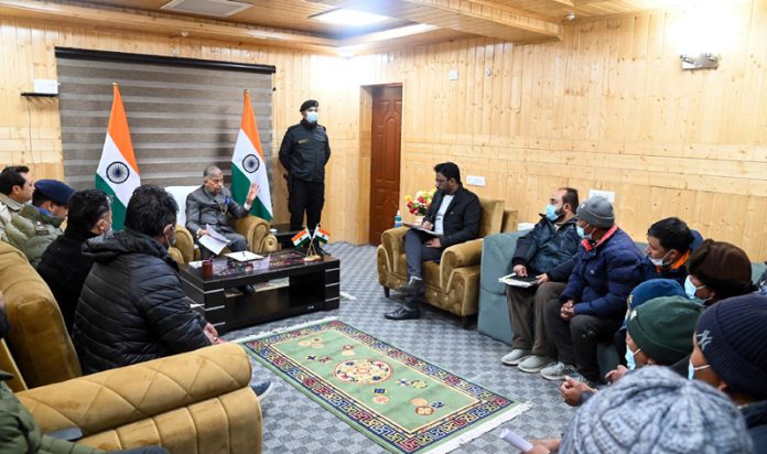 Ladakh LG, Brig. (Dr.) B.D Mishra (Retd.) chairs a meeting at Kargil on Friday.