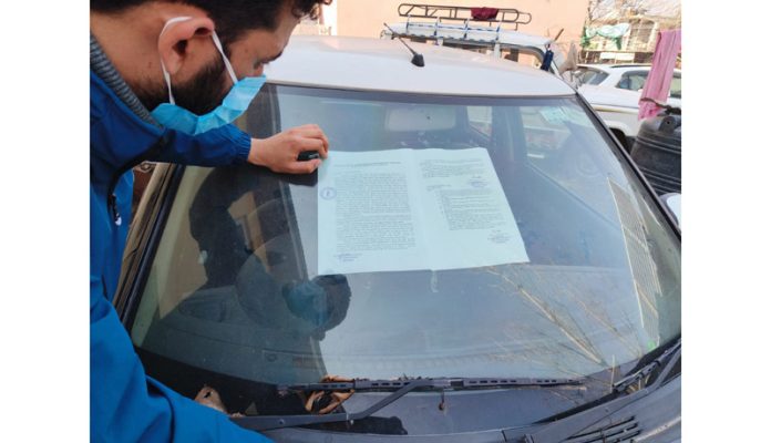 A car being attached by police in Baramulla on Sunday.