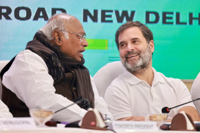 Congress president Mallikarjun Kharge with party leader Rahul Gandhi at a meeting of the party in New Delhi on Thursday. (UNI)