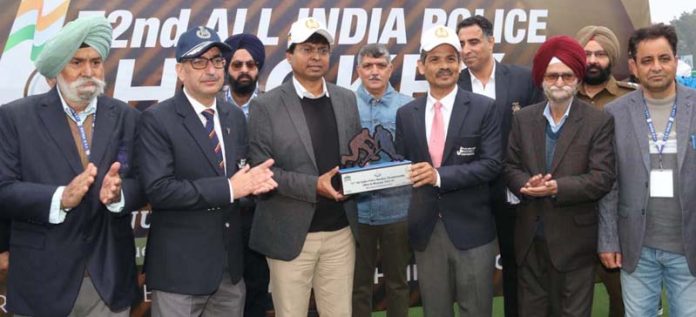 DGP R.R. Swain presenting a memento to President of Hockey India and former captain of Indian Hockey team, Dilip Tirkey at Jammu on Tuesday.