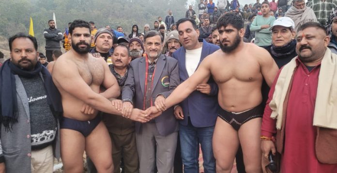 Dignitaries introducing wrestlers before bout during Dangal at Reasi on Tuesday.  