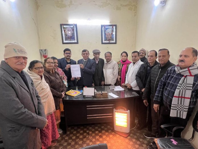 Office bearers of Mahajan Sabha Channi Himmat posing together during a meeting in Jammu.