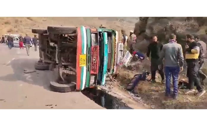 A minibus which met with accident in Taryath area of Rajouri on Sunday. -Excelsior/Imran