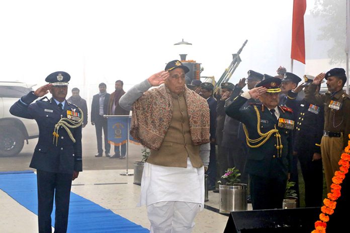 Defence Minister Rajnath Singh paying homage to the fallen heroes at the War Memorial in Kanpur on Sunday. (UNI)