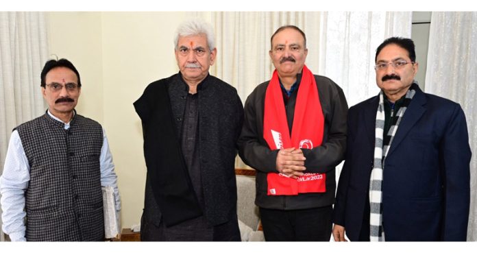 LG Manoj Sinha posing for a group photograph with delegation of Martand Trust Mattan on Saturday.