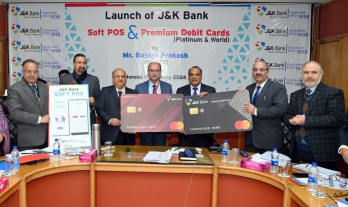 MD and CEO of J&K Bank, Baldev Prakash along with senior executives launching the Bank's Soft POS and Premium Debit Cards.