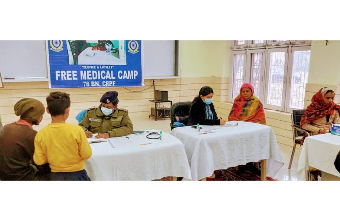 Patients being screened at a medical camp organised by CRPF in Jammu on Wednesday.