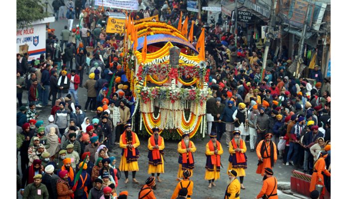 A grand ‘Shobha yatra’ being taken out by Sikh community in connection with birthday of Guru Gobind Singh Ji in Jammu on Wednesday. -Excelsior/Rakesh