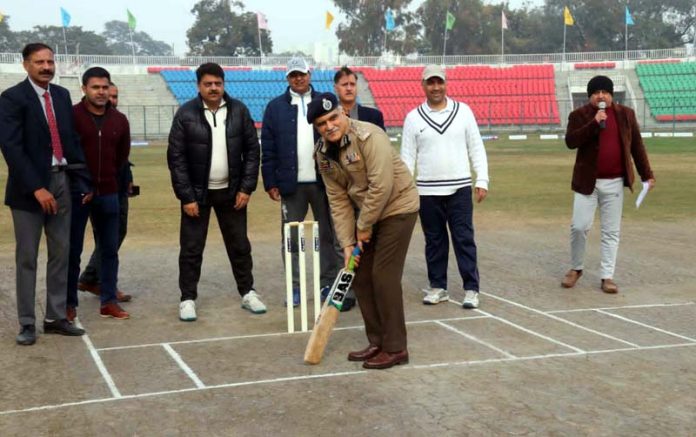 DIG Shakti Pathak testing his batting skills during inaugural ceremony of 2nd Masters Cricket Championship at Jammu.