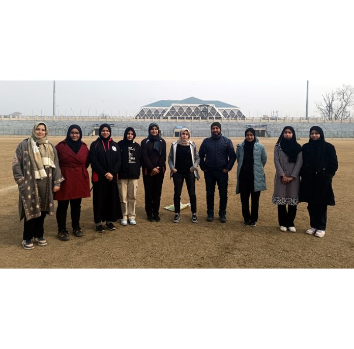 J&K Junior Girls Cycle Polo team posing for photograph. 