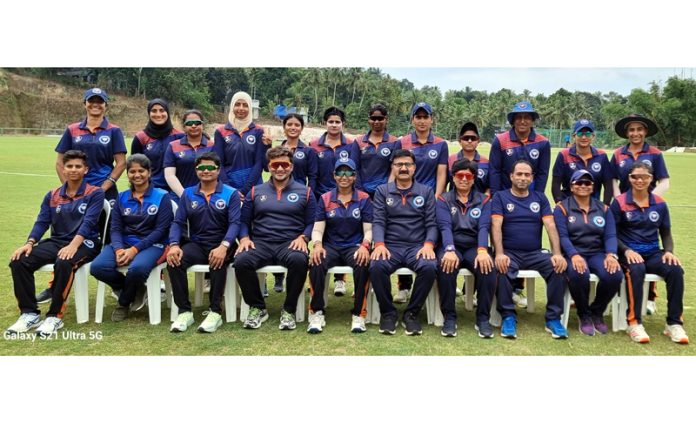 Senior Women's Cricket team of J&K posing for group photograph along with support staff.
