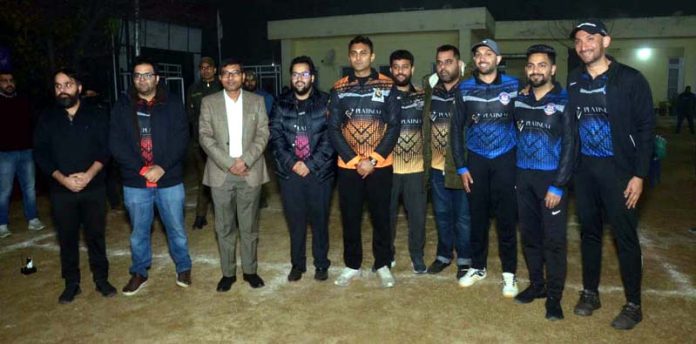 JMC Commissioner Rahul Yadav posing with members of Platinum Business Sports Network in Jammu.