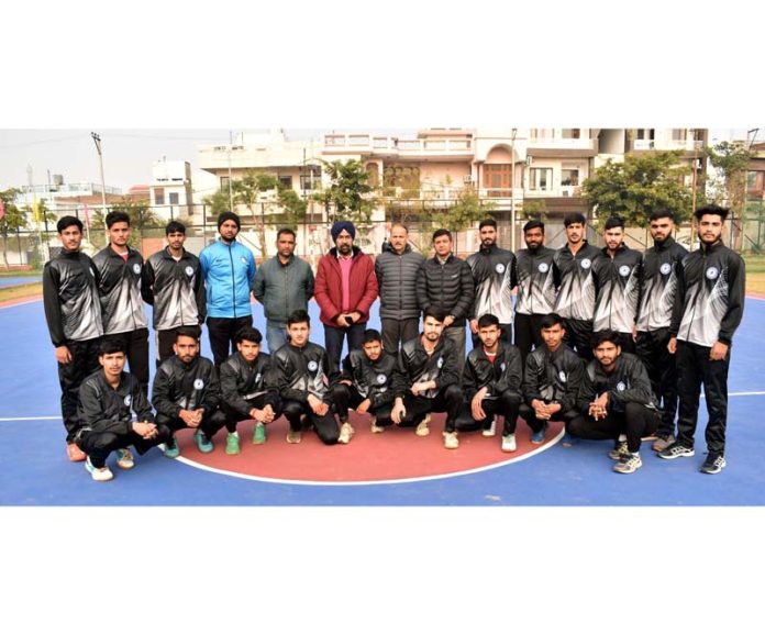 Junior Handball team of Jammu and Kashmir posing with Baljinder Pal Singh, Divisional Sports Officer and others before leaving for national championship.
