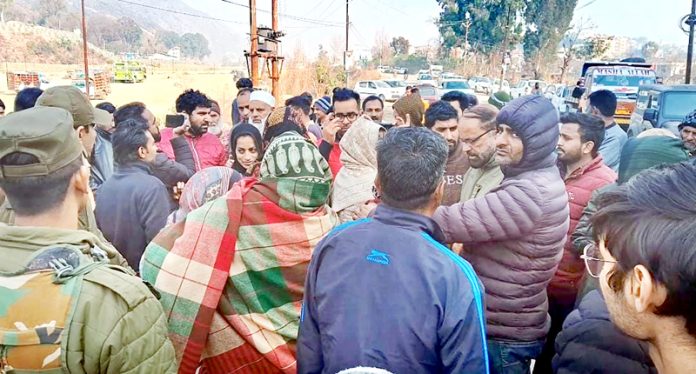 People protest after elderly man was crushed to death by car in Rajouri. -Excelsior/Imran