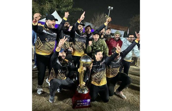 Winning team posing for group photograph along with trophy at Jammu.